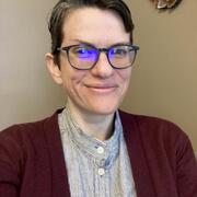 headshot of Ash Mitchell