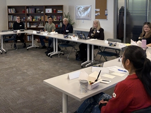 conference room with faculty and Documenters lead at The Beacon