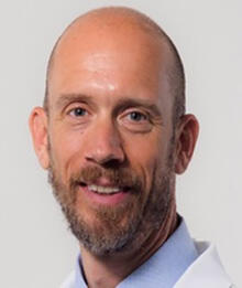head shot of Dr Jonathan Shepherd