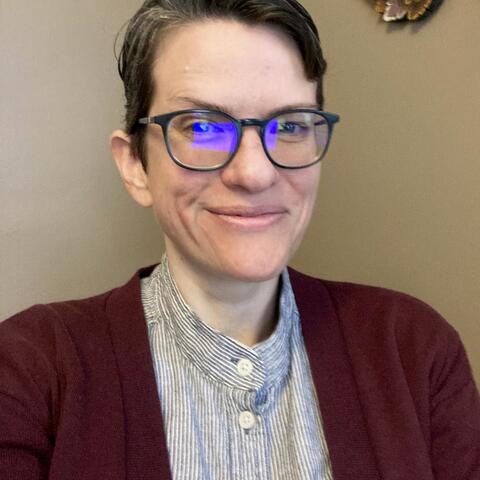 headshot of Ash Mitchell