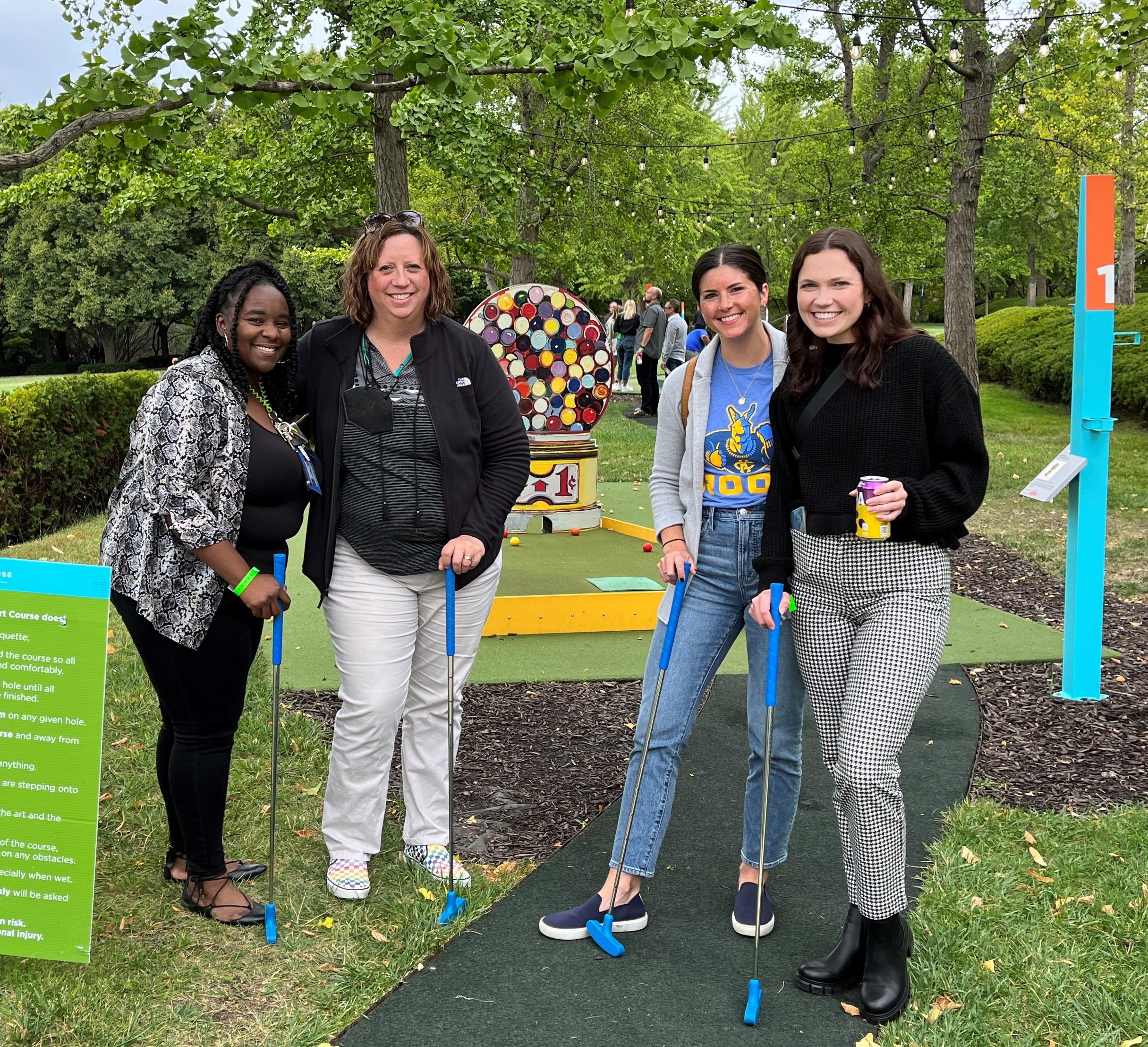 Dr. RP playing mini-Golf at the Nelson Atkins with MAHE students and alumni