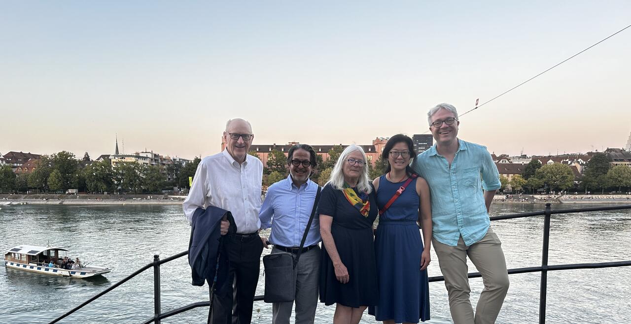 IMage of people standing on a dock
