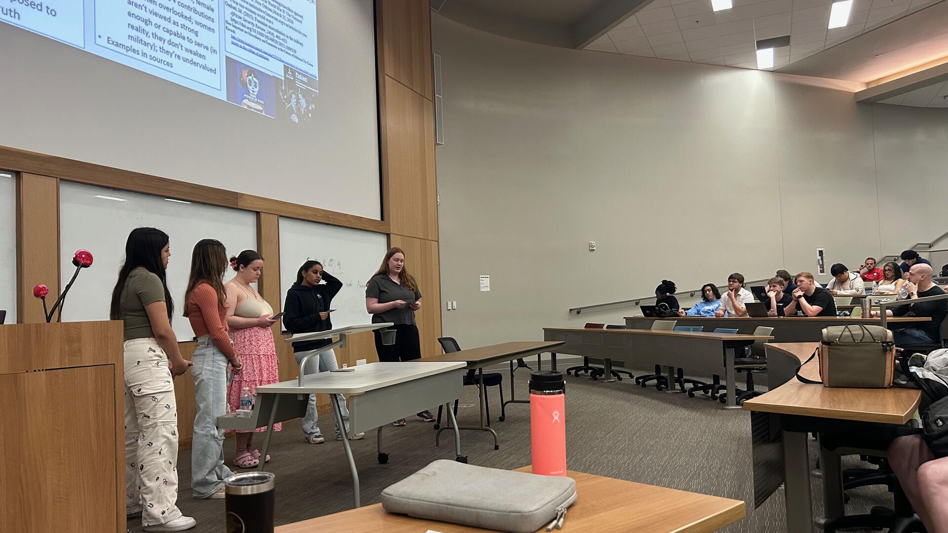 Students presenting in Bridging the Gap class